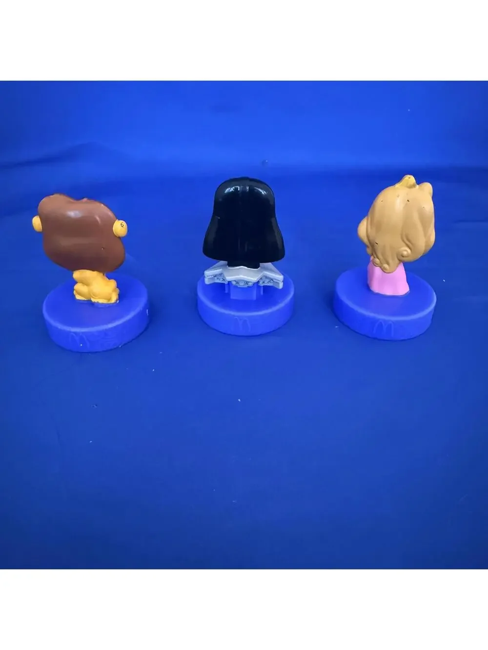 3 Figures McDonald's Happy Meals, celebrating Disneyland's 70th anniversary